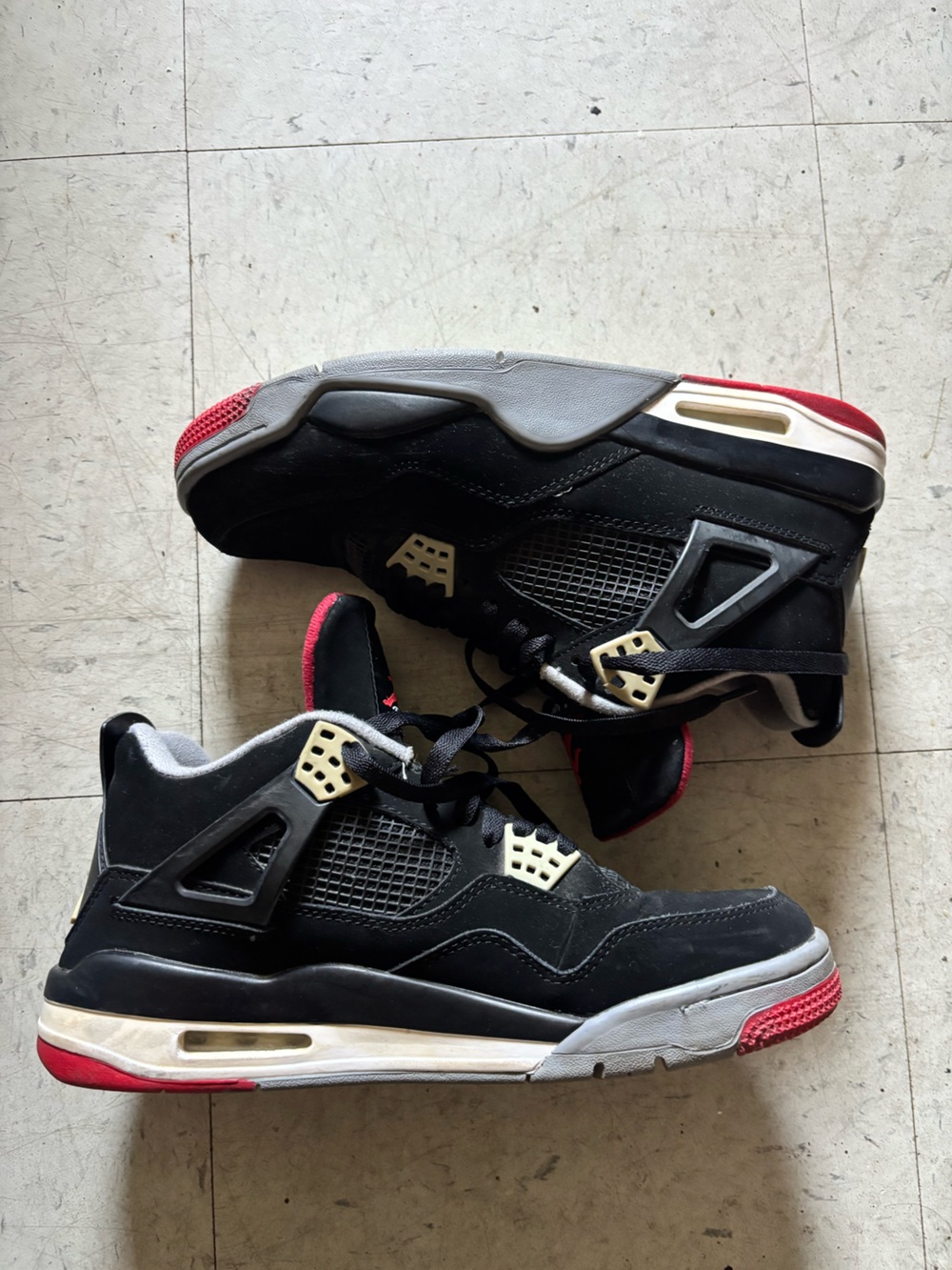 Air Jordan 4 Retro (Black/Red colorway).